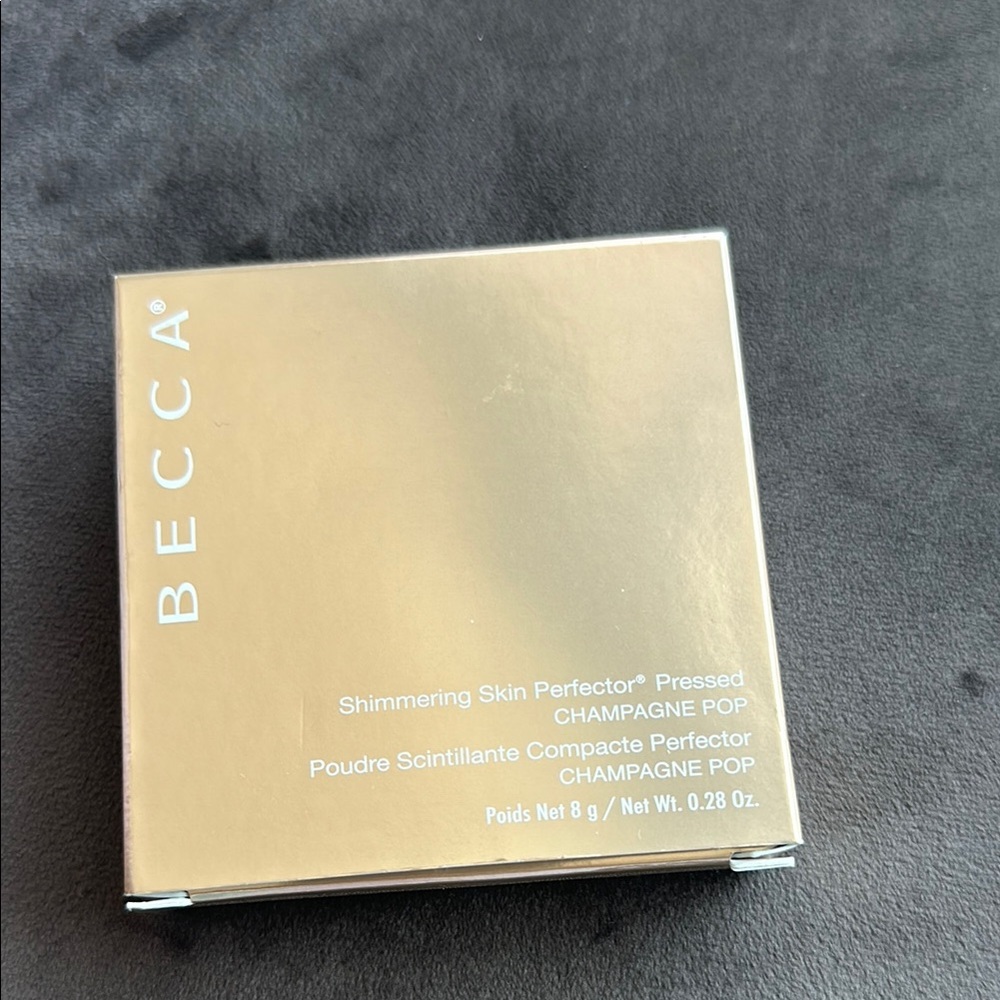 BECCA Gold Skincare Compact